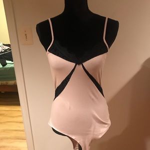 Tan bodysuit with black lace detailing